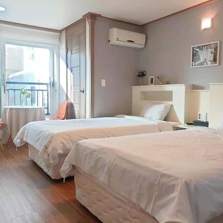 HY Choi Hostel Seogwipo-stad Buitenkant foto