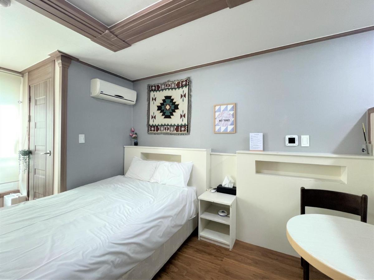 HY Choi Hostel Seogwipo-stad Buitenkant foto